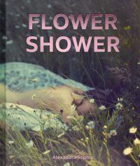 Book cover of Flower Shower, with a nude figure lying in a field of daisies. Published by Images Publishing.