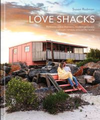 Coastal shack with couple sitting on steps, orange sky above, LOVE SHACKS, in white font above.