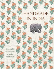 Book cover of Handmade in India: A Geographic Encyclopedia of Indian Handicrafts, with a ceramic elephant, and floral print. Published by Abbeville Press.