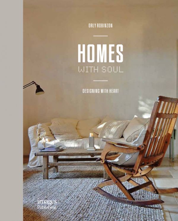Book cover of Homes With Soul : Designing with Heart, with a wooden rocking chair on woven rug, cream walls and soft sofa. Published by Images Publishing.