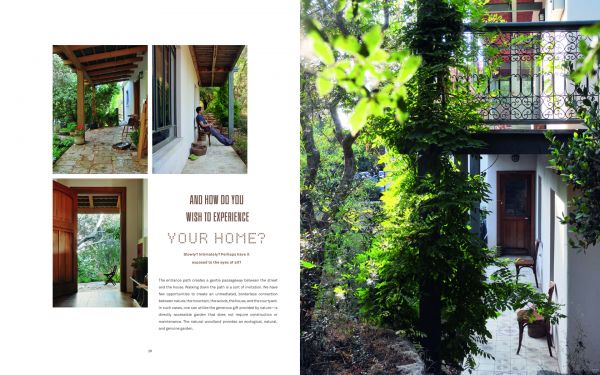 Book cover of Homes With Soul : Designing with Heart, with a wooden rocking chair on woven rug, cream walls and soft sofa. Published by Images Publishing.