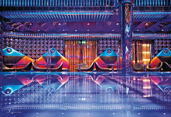 Book cover of Design on the High Seas: Setting the Scene for Entertainment Architecture Aboard Cruise Ships, featuring a grand theatre interior with stage area. Published by Images Publishing.