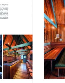 Restaurant bar interior, scallop wall facings, orange stools, The Art of Bar Design in white font to top right