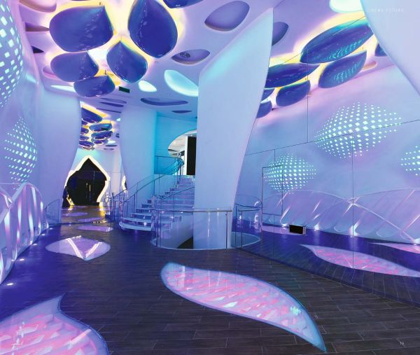 Book cover of Alexander Wong: Archiphantasy, with a futuristic spaceship like interior in bright blue and pearlescent white. Published by Images Publishing.