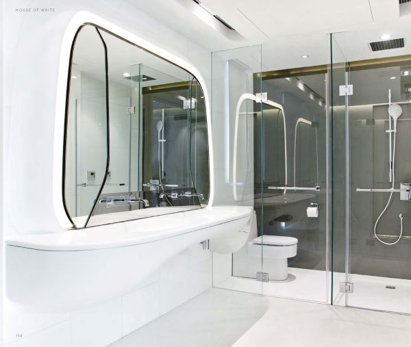 Book cover of Alexander Wong: Archiphantasy, with a futuristic spaceship like interior in bright blue and pearlescent white. Published by Images Publishing.