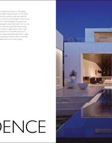 Book cover of The American House: 100 Contemporary Homes, featuring a a cabin at the bottom of the mountains. Published by Images Publishing.