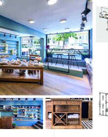 Bakery shop interior with glass display cabinets, cakes underneath, Bakery Design in white font to upper right.