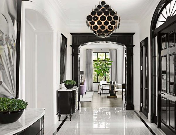 Book cover of Richard Manion Architecture: Streamlined, with an entrance with two ceramic urns and large lighting fixture. Published by Images Publishing.