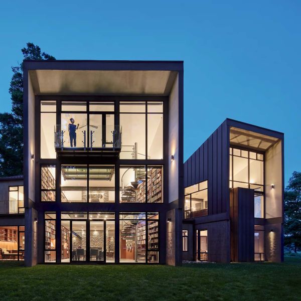 Book cover of HomeWork: New Houses | Changed Houses | Not Houses, with a modern house elevation, with large windows. Published by Images Publishing.