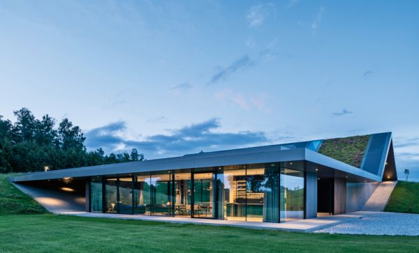 Book cover of Radical Living: Homes at the edge of architecture, with a tall, rounded edge building. Published by Images Publishing.