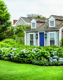 Blue cover with orange silhouette of grass, NANTUCKET Classic American style 30 miles out to sea in white font above.