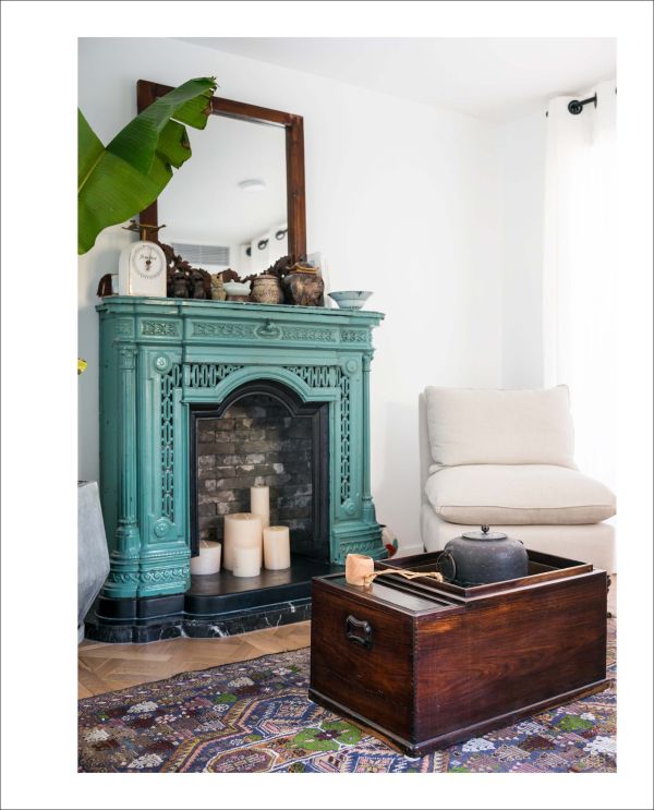 Book cover of Residences Reimagined: Successful Renovation and Expansion of Old Homes, featuring an interior room with exposed brickwork, beamed ceiling, and an armchair on white tiled floor. Published by Images Publishing.