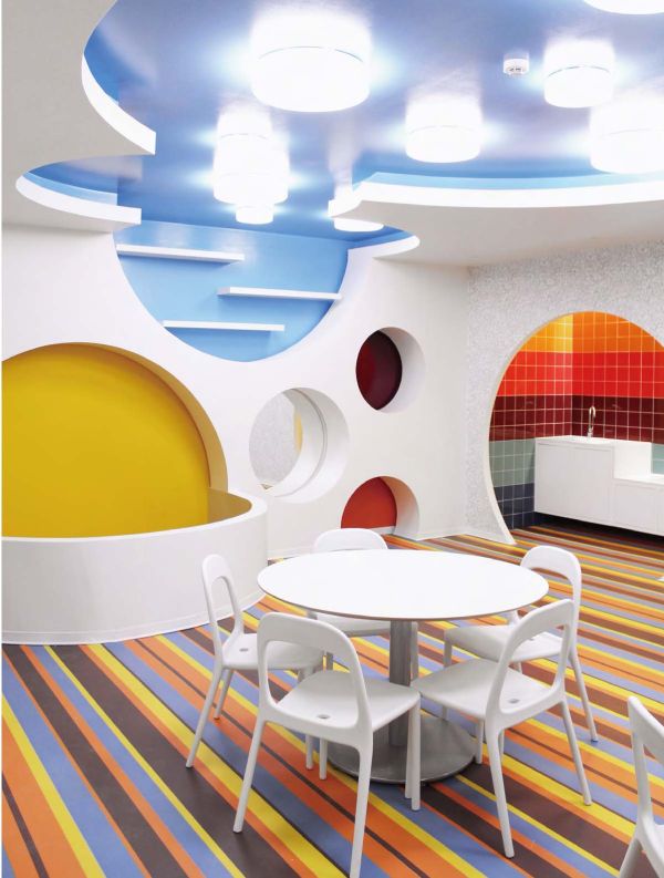 Book cover of Contemporary Creative Spaces for Children, featuring two boys playing on suspended multicoloured webbing. Published by Images Publishing.