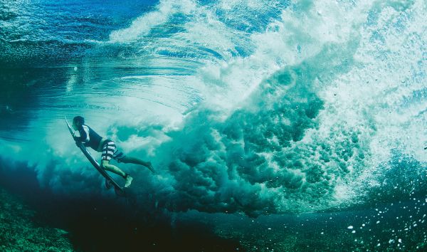 Book cover of Life Around the Sea: Capturing the Heart of Australian Surf Culture, with the waves of the sea, and land behind. Published by Images Publishing.
