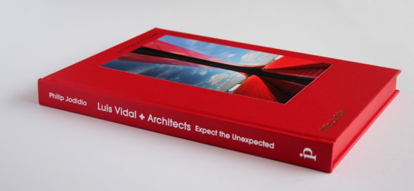 Book cover of Expect the Unexpected: luis vidal + architects, with part of the red structure of the Boston Logan International Airport Terminal E. Published by Images Publishing.