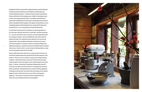 Book cover of Chefs' Kitchens, with a row of kitchen utensils: orange colander, hand whisks, pans and a sieve. Published by Images Publishing.