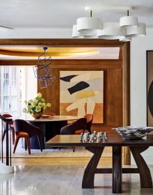 Book cover of Tailored Interiors: The Bespoke Designs of Patrick Sutton; featuring a circular interior with a spiral staircase and curved bench. Published by Images Publishing.