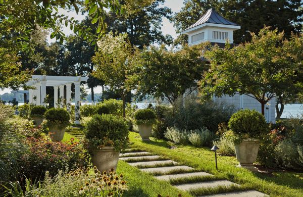 Book cover of Enduring Gardens: The Tame and the Wild; featuring a landscaped garden with swimming pool, and fire pit. Published by Images Publishing.
