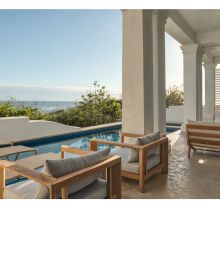 Book cover of Coastal Villas: Luxury Living on the Gulf Coast; featuring a luxury villa with swimming pool. Published by Images Publishing.