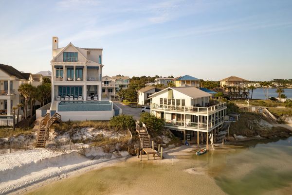 Book cover of Coastal Villas: Luxury Living on the Gulf Coast; featuring a luxury villa with swimming pool. Published by Images Publishing.